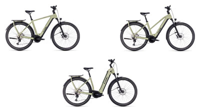 Er zijn drie witte Cube Kathmandu Hybrid e-bikes te zien, elk met een diamantframe, een trapezframe en een lage instap frame.